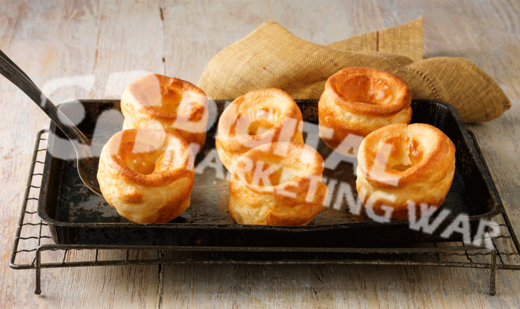 Dish featuring Yorkshire pudding and sausages Crossword Sign